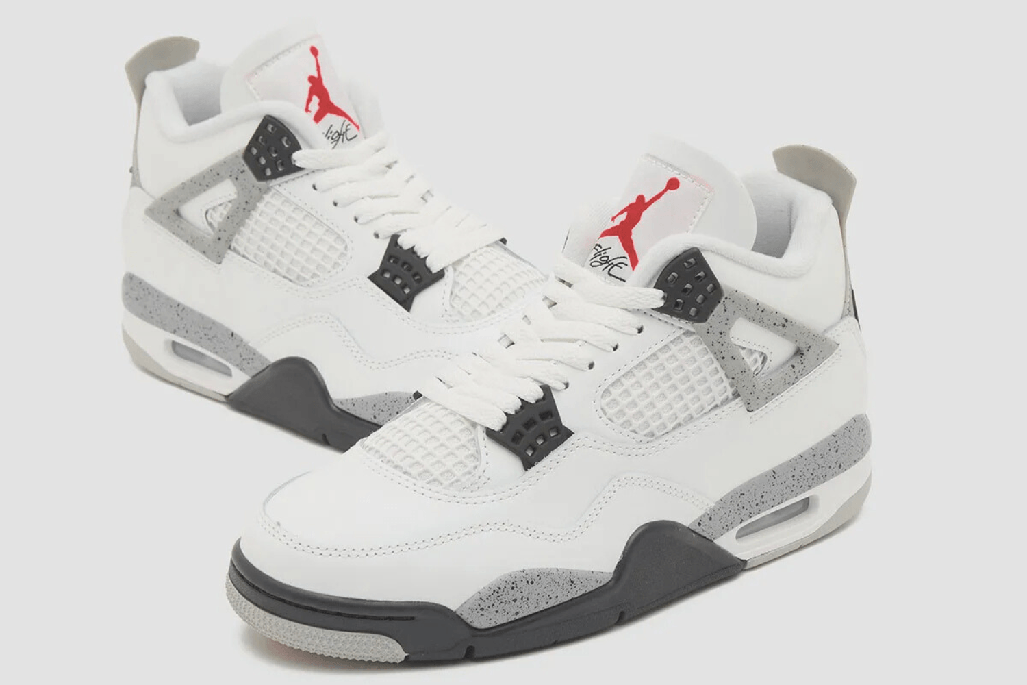 Official retail images of the Air Jordan 4 'White Cement' have dropped