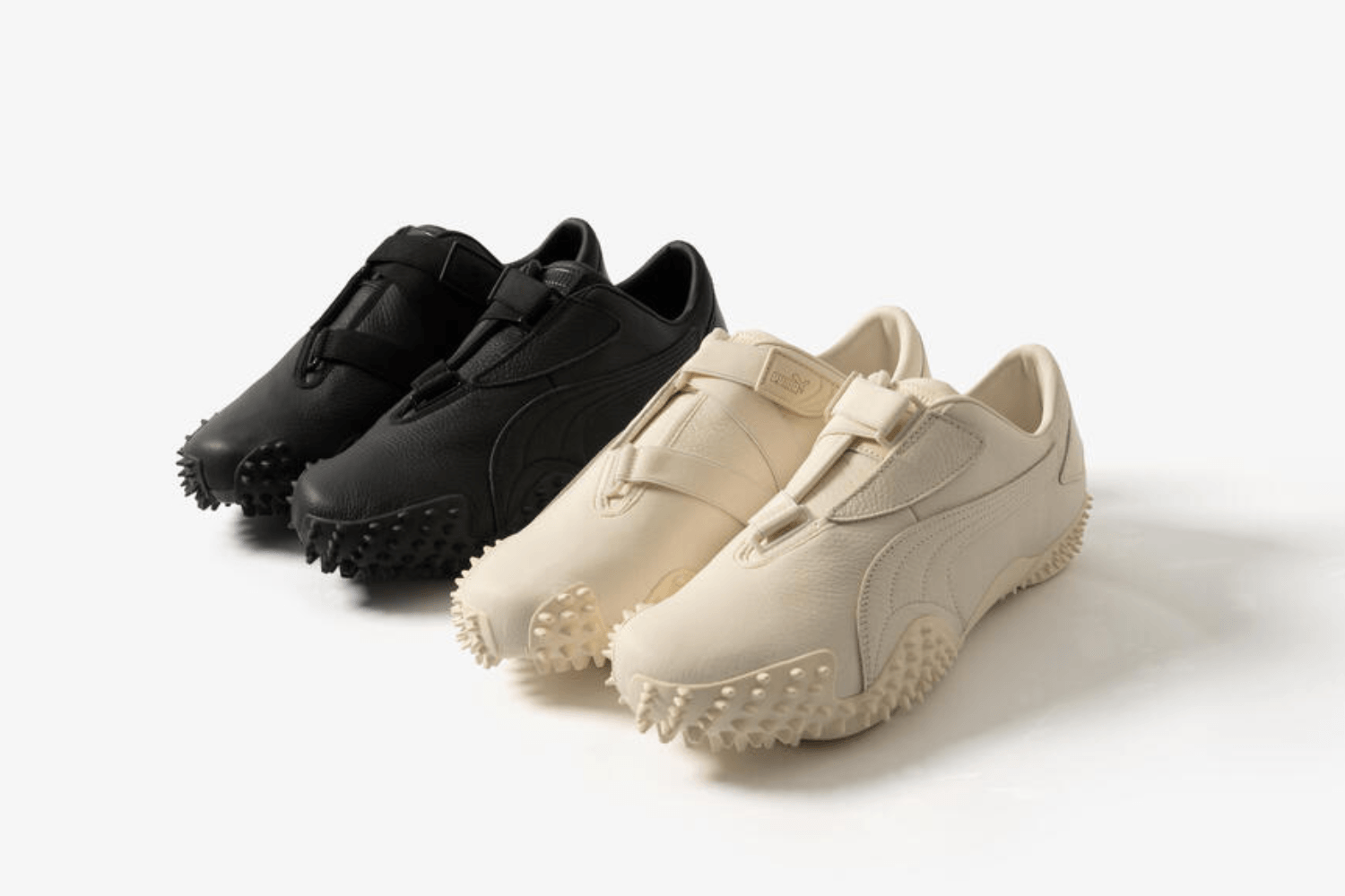 The PUMA Mostro appears with a leather upper