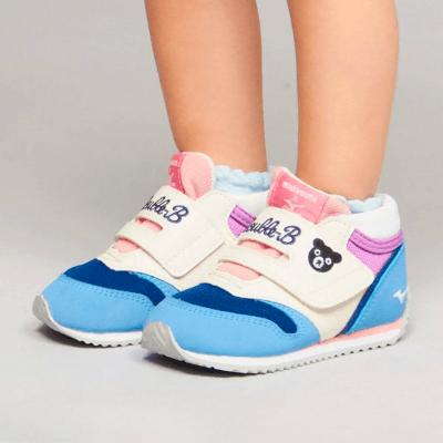 Child wearing Miki House x Mizuno sneaker collaboration