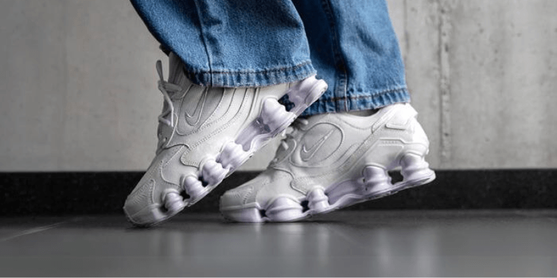 nike shox tl womens white with purple sole on feet