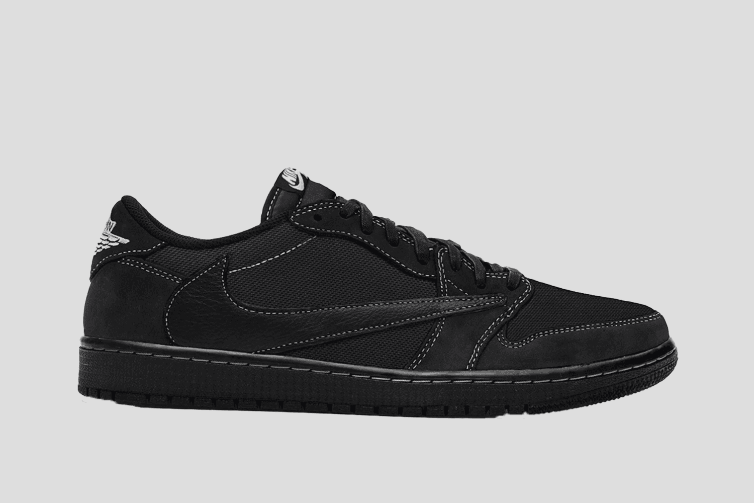 Travis Scott x Air Jordan 1 Low 'Triple Black' spotted