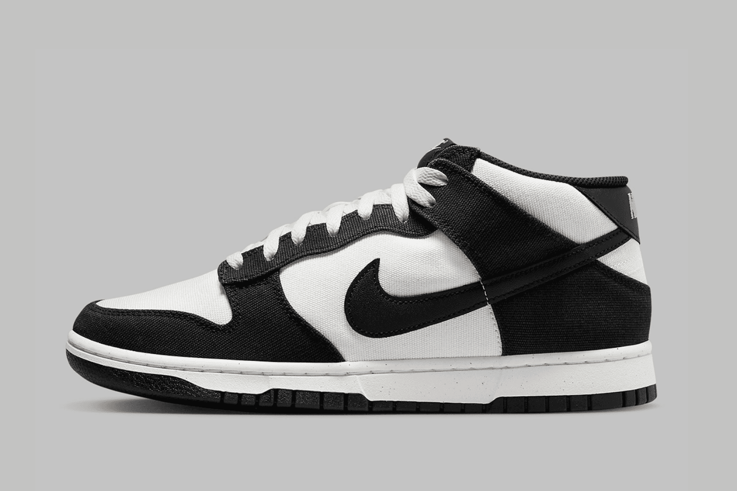 The Nike Dunk Mid 'Panda' drops 2023