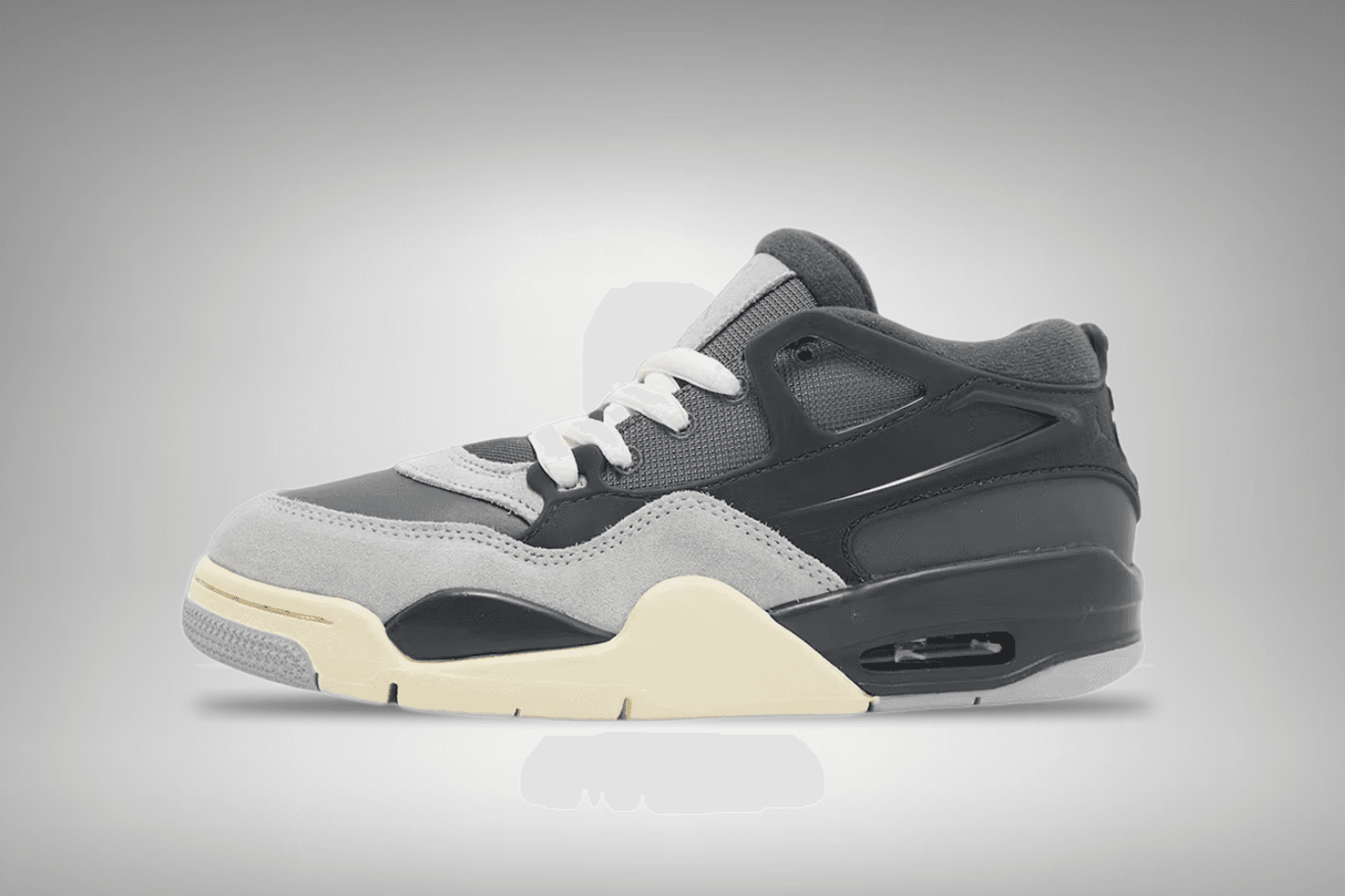 The Air Jordan 4 RM appears in an 'Iron Grey'