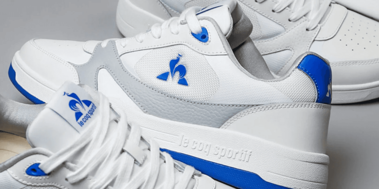 white le coq sportif sneakers with blue detail