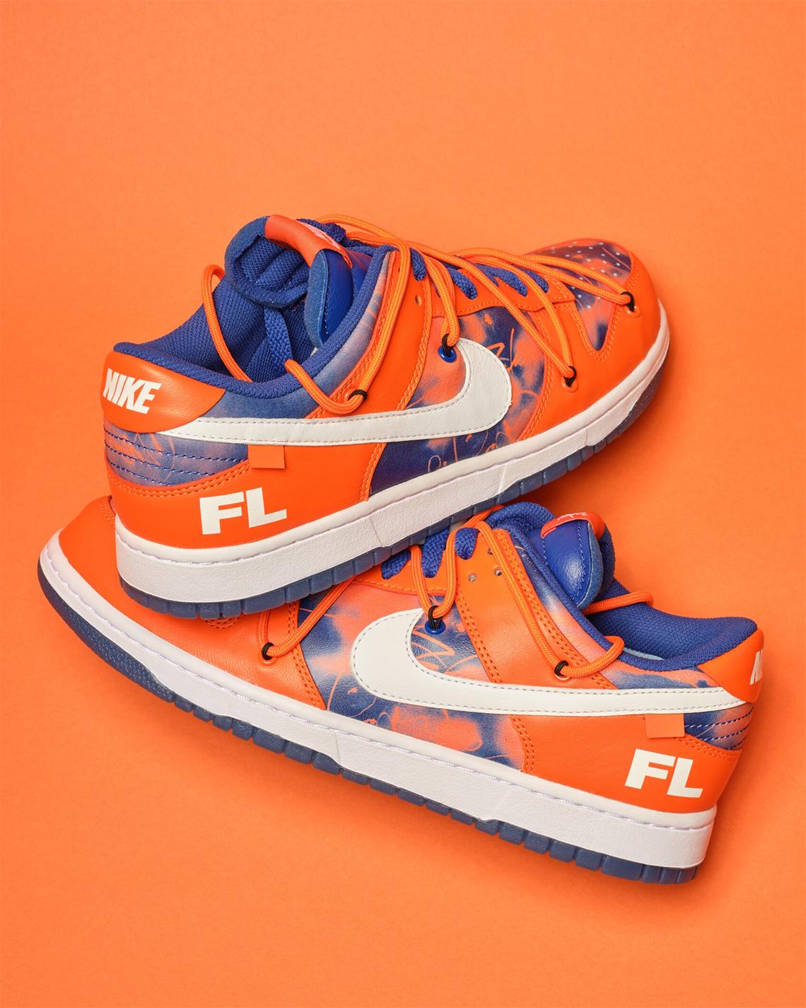 The Futura x Off-White x Nike Dunk 'Syracuse' met oranje achtergrond