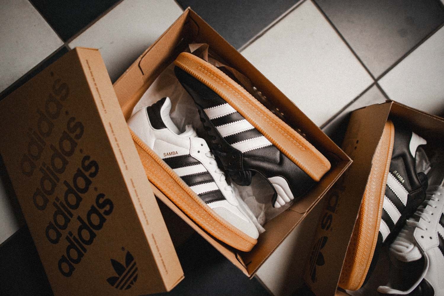 Explore the trendy adidas Samba XLG in 'White Gum' & 'Black Gum'