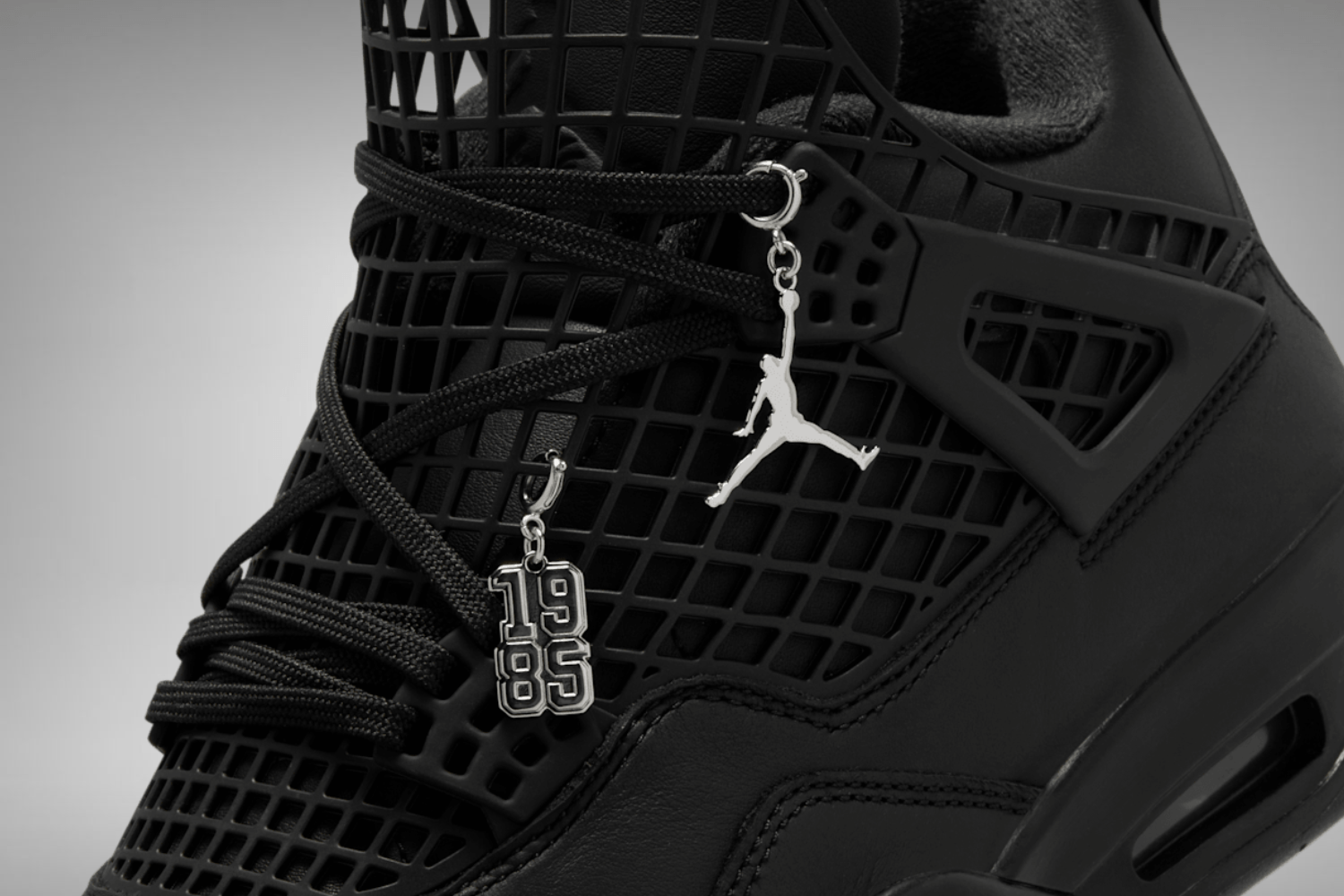 The Air Jordan 4 NET WMNS arrives in a ‘Black Cat’ colorway