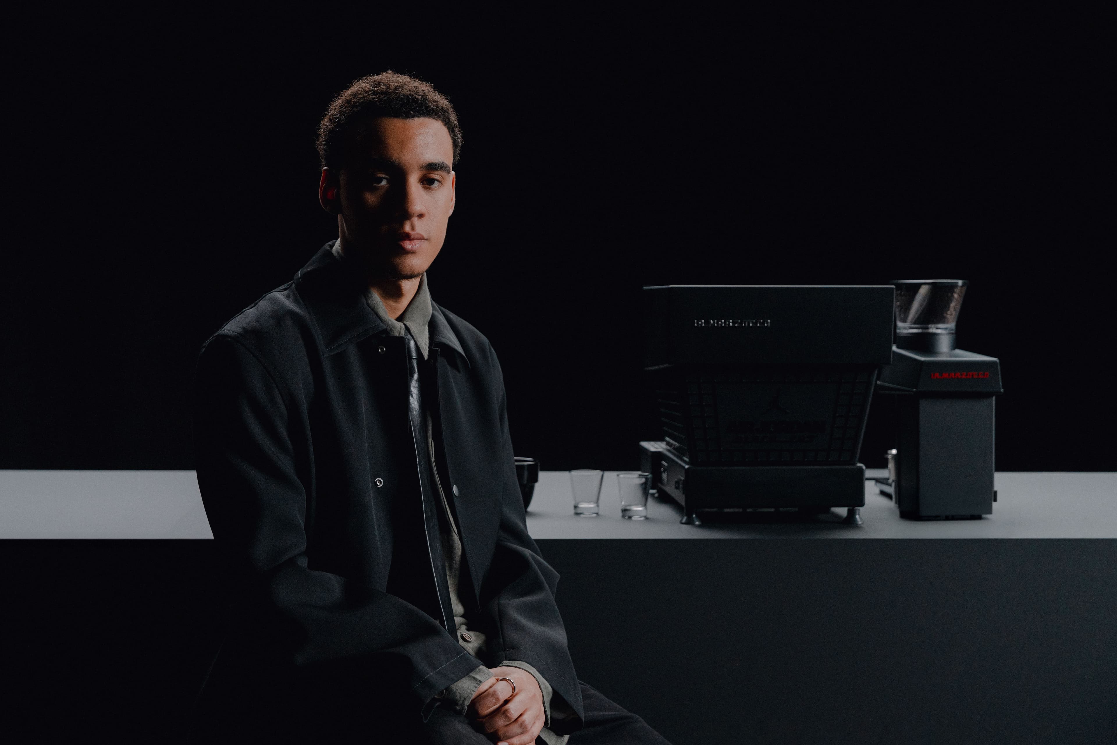 Jamal Musiala Air Jordan 4 Black Cat solebox