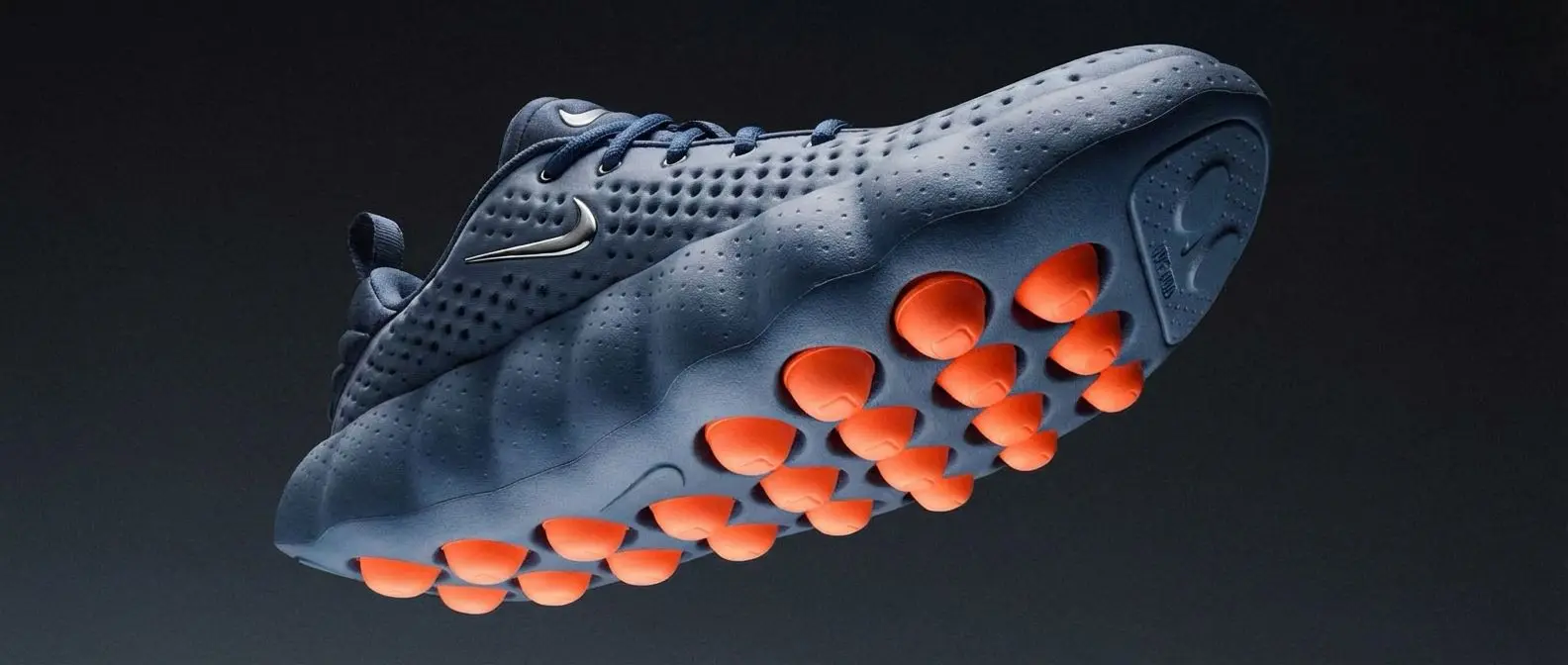 A picture of the Nike mind 002 in the Light Smoke Grey colorway